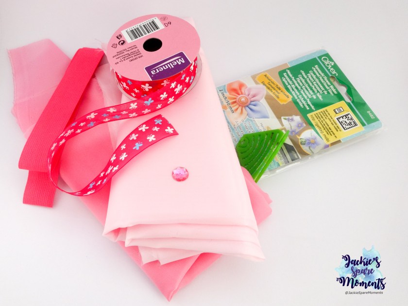 Materials used. Clover Kanzashi maker Pointed Petal small size, fabric, ribbon, elastic, raisin bead