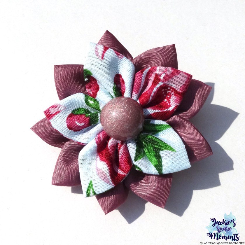 Floral hair bow with holo nail polish centre, polished with A England Anne of Cleves