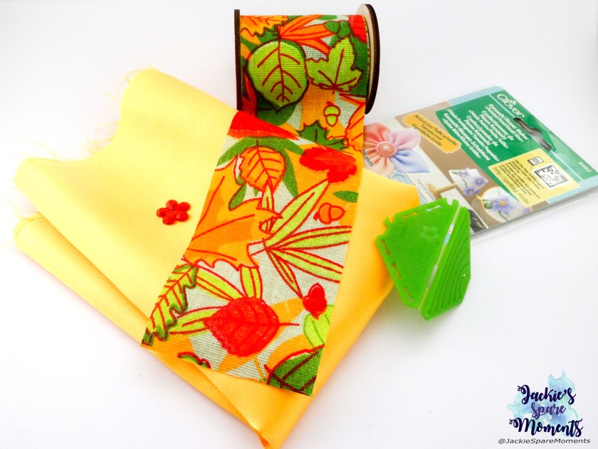 Materials used: yellow satin, autumn leaf printed ribbon, clover kanzashi flower maker pointed petal small, red raisin flower flatback