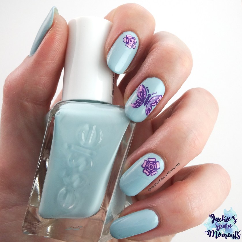 Spring nail art with butterfly using Essie Getting Intricate