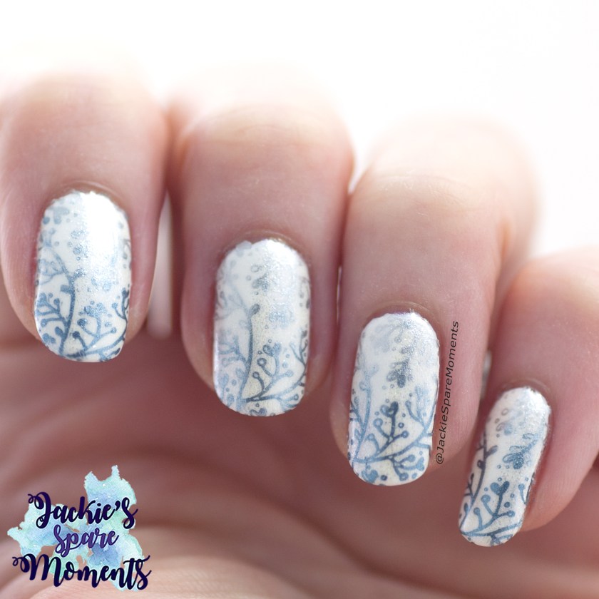 Winter nail art design in White, Blue and Silver