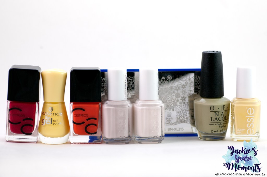 Materials used for tulip nail art: Catrice ICONails 02 Bloody Mary To Go, essence 38 love is in the air, Catrice ICONails 46 Work Hard, Play Orange, Essie Urban Jungle, Essie Peak Show, OPI This Isn't Greenland, Essie Hay There, Maniology stamping plate BM-XL215, black stamping polish (not pictured)