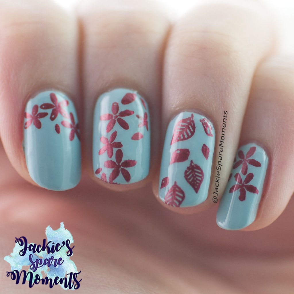 Light blue nails with red stamping images