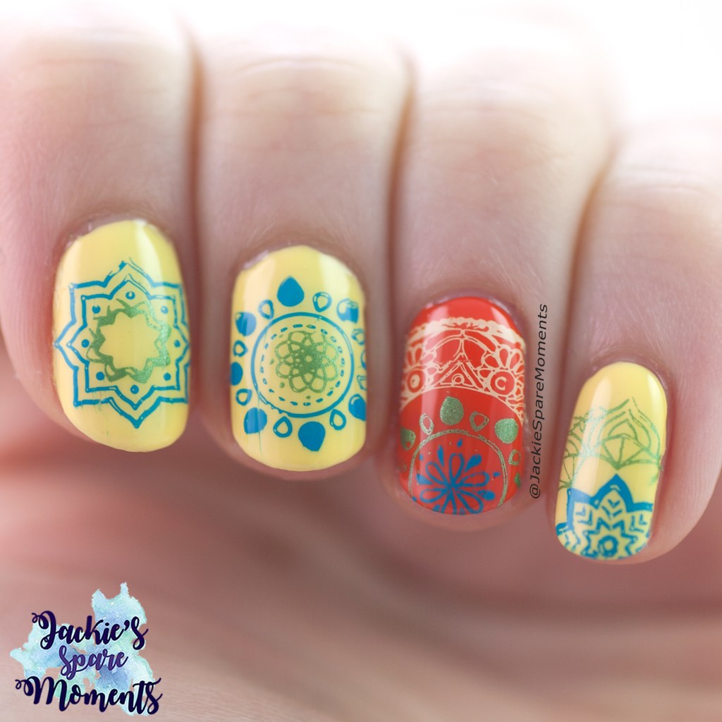 Mandala nail art in blue, green, yellow and orange