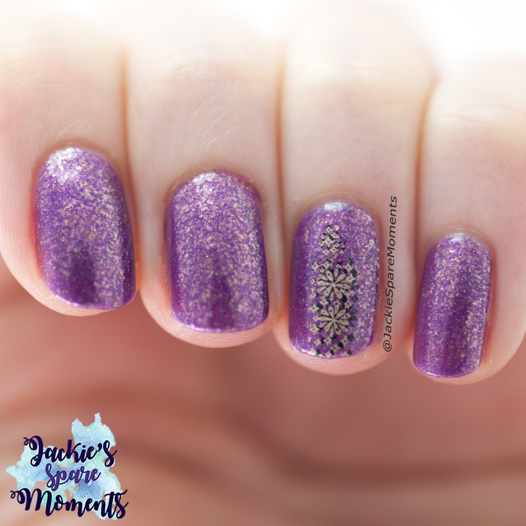 purple nails with candle