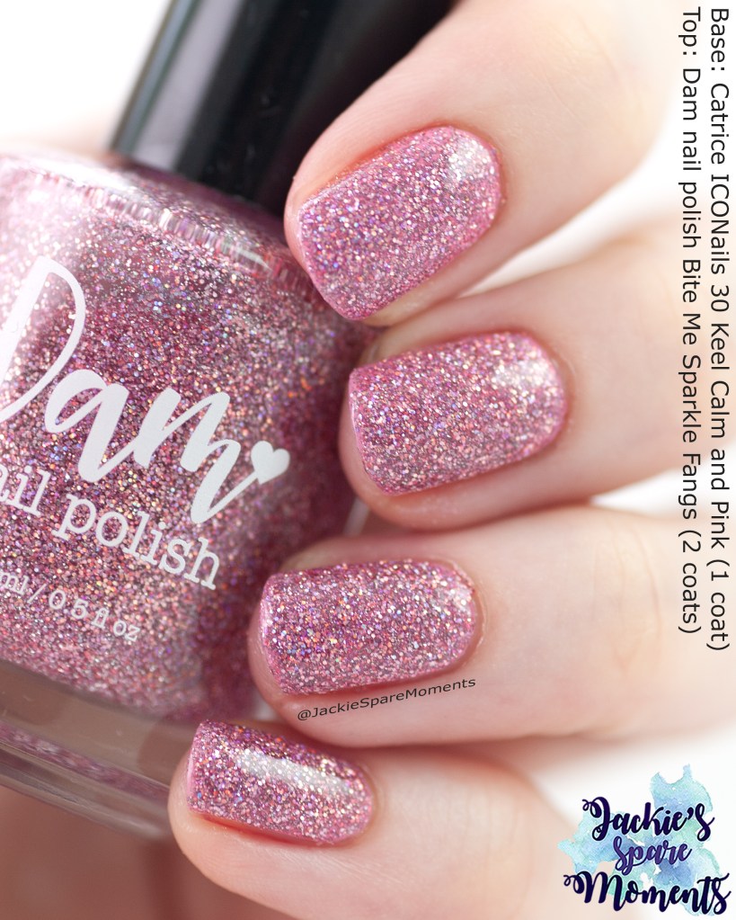 Dam nail polish Bite Me Sparkle Fangs pink jelly nail polish with holographic glitter, reflective glitter and pink micro glitter