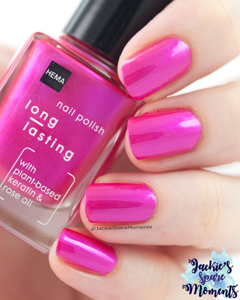 HEMA nail polish Candy Twinkle bright hot pink nail polish with some shimmer.