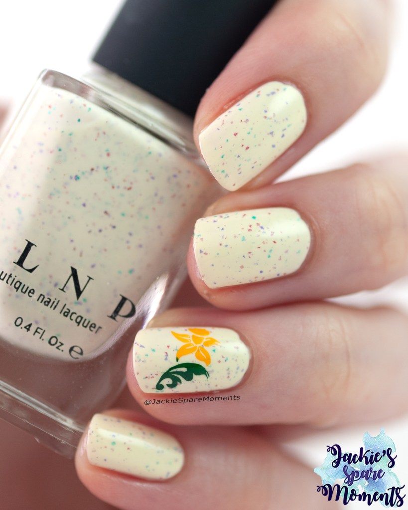 soft yellow speckled polish with flower narcissus image