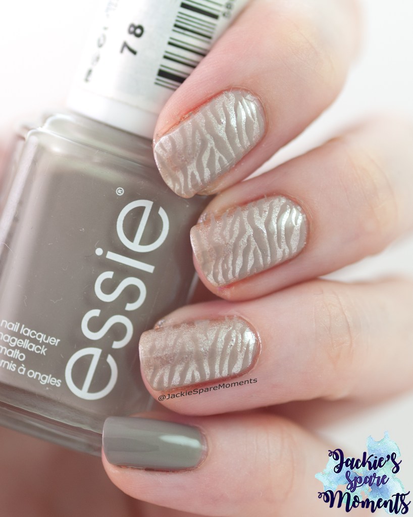 Zebra nail art matching a summer dress
